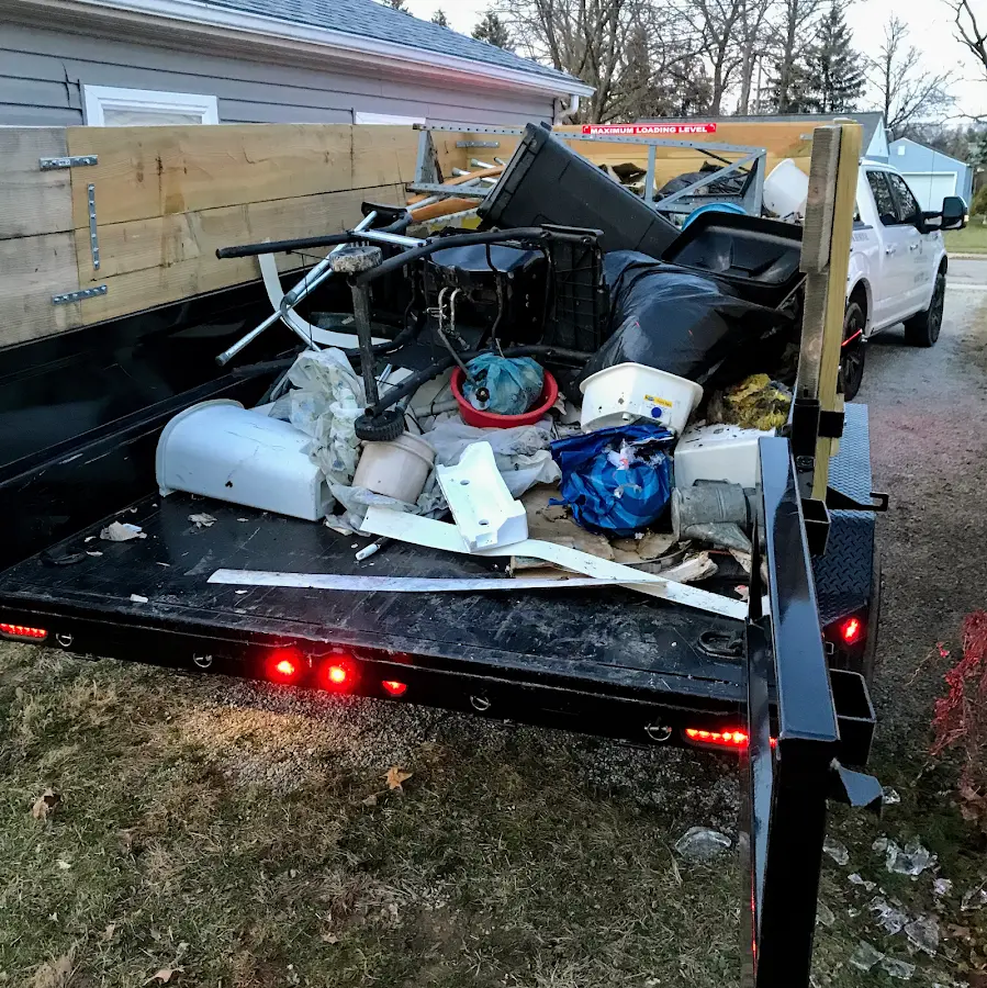 Roll-off dumpster delivered to a residential driveway in Eliot
